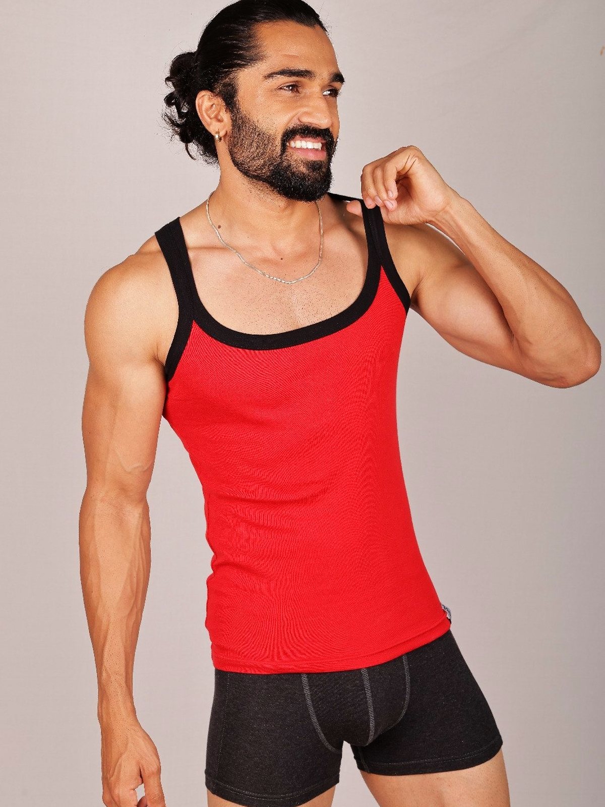 A model in a Viswak coloured cotton gym vest